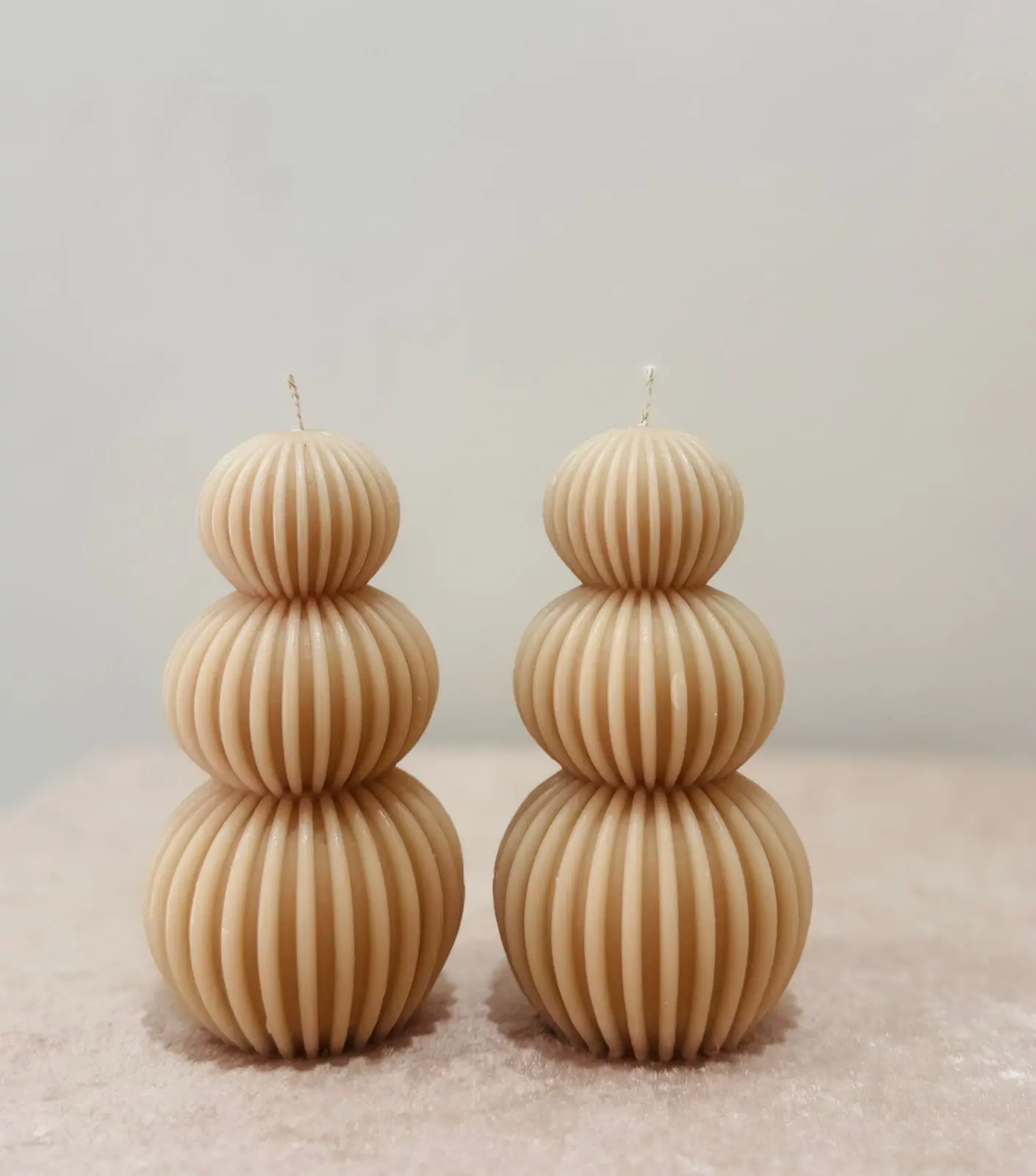 Nude Triple Sphere paraffin wax candles.